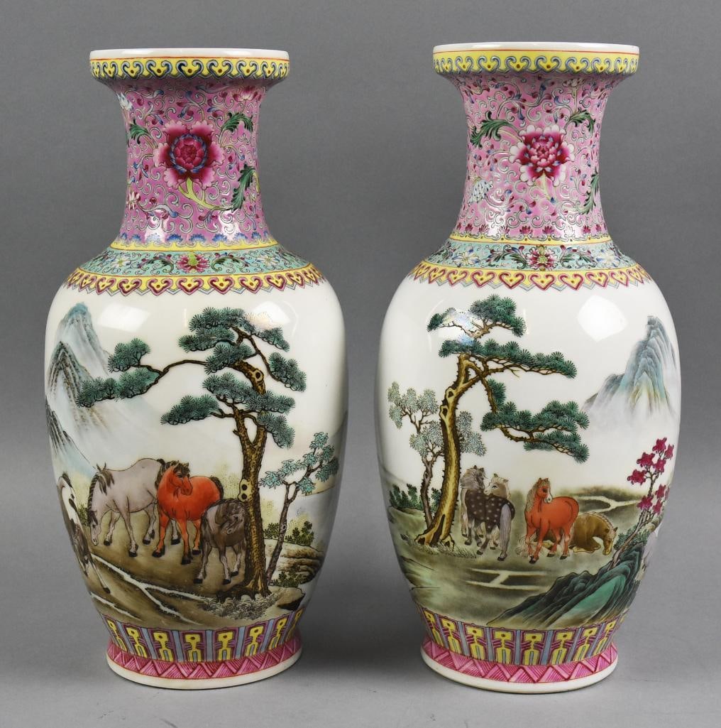 Vintage Chinese Porcelain Horse Vases w/ Calligraphy: These are stunning vintage porcelain vases from China. Each appears hand painted enamel with horses grazing among the trees. Back is also horses with mountains in the background. There is beautiful ca