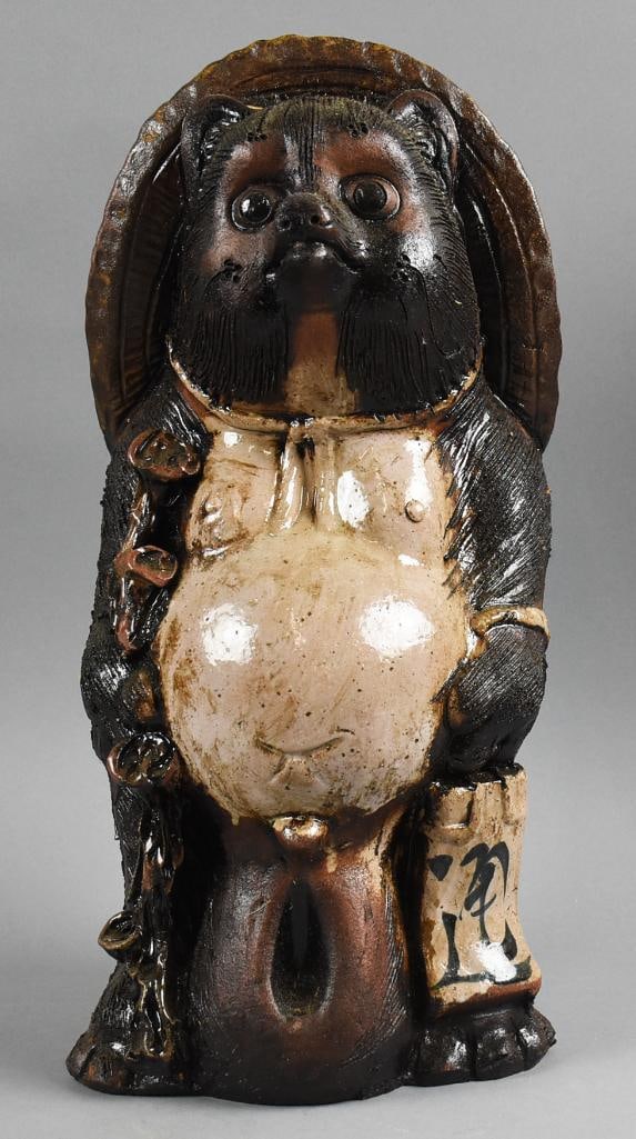 Vintage Japanese Earthenware Tanuki Sculpture: This fun piece is a Japanese Tanuki sculpture that appears to be earthenware. Retains original label and stands approx. 18" tall. This piece was in a Japanese decor shop in Little Tokyo near downtown