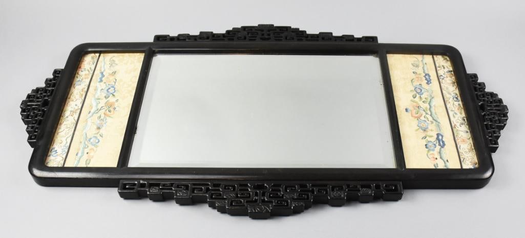19th Century Chinese Lacquer & Silk Mirror: This is a gorgeous mirror of Chinese origin. Wonderful carved accents on top and sides with embroidered silk inserts on each side. Beveled mirror appears original and measures 18" tall x 36" wide