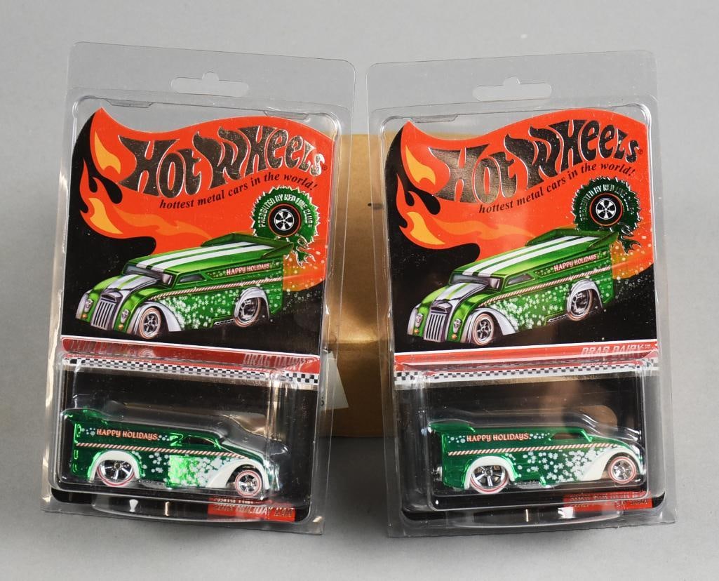 (2) 2013 l Hot Wheels Holiday Drag Dairy LE-MOC-NOS: Lot is a pair of 2013 Mattel Hot Wheels Holiday Drag Dairy Limited Edition 2184/4000 and 3953/4000 MOC-NOS. They are numbered 2184 and 3953 of 4000. Single owner collection from the largest toy collec