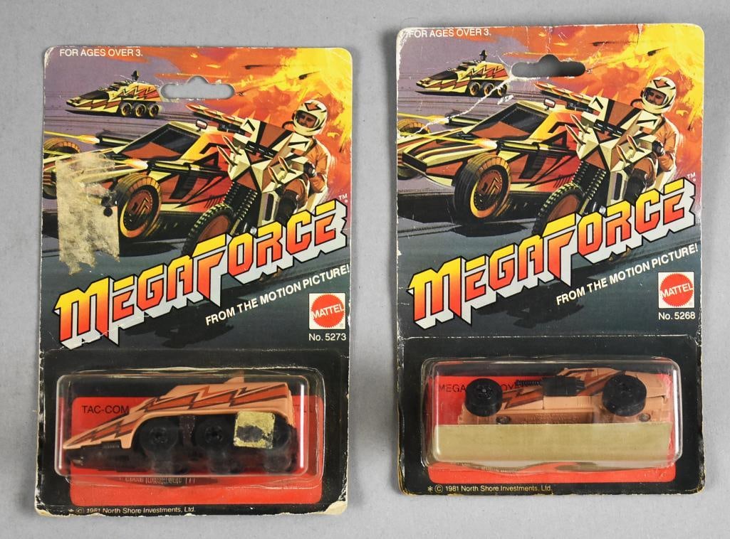 (2) 1981 Mattel Megaforce Movie Die-Cast - MOC-NOS: Lot is two 1981 Mattel Megaforce Movie Die-Cast - MOC-NOS. Includes Mega Destroyer and Tac-Com. Single owner collection from the largest toy collector on the West Coast.