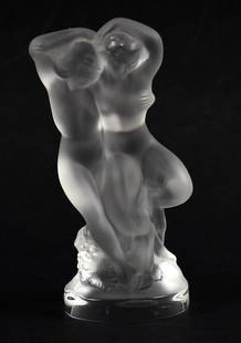 Lalique Frosted Crystal Le Faune Figural Grouping: Lovely Lalique frosted crystal figural grouping. This grouping is called "Le Faune" and features Pan the faun dancing with Diana the Hunter. Nice visible signature on base, post 1978. Measures approx.