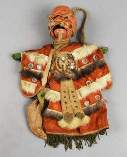 19th Century Chinese Hand Painted Actor Marionette: Very cool antique marionette from China. He appears to be a representation of an actor or opera singer. His face appears hand carved with heavy painted features and some sort of bolt in his cheeks so