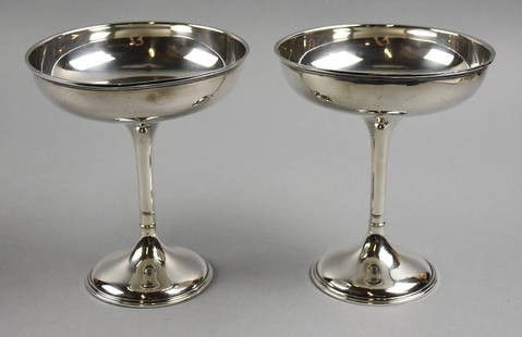 Vintage Watson Sterling Silver Hollowware Compotes: Sleek and simple elegance in this pair of sterling compotes. Each is well marked, they are weighted. Both are approx. 7" tall x 6" wide with an overall approx. weight 704 grams.