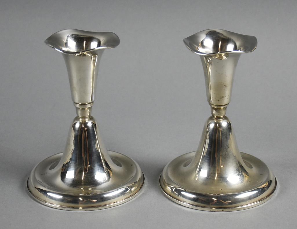 Vintage International Silver Sterling Weighted Candle Holders: Stunning pair of vintage candle holders. They are from International Silver and are sterling with weighted base. Each with wavy ruffle and simple elegant bases. Marked on base, both approx. 5" tall, o