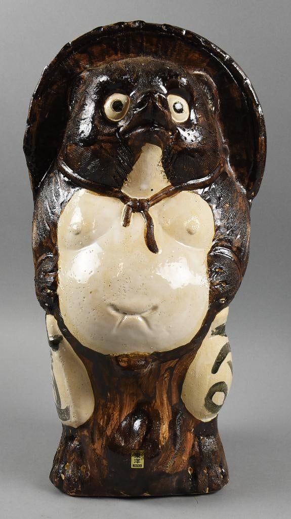 Vintage Japanese Earthenware Tanuki Sculpture: This fun piece is a Japanese Tanuki sculpture that appears to be earthenware. Retains original label and stands approx. 19" tall. This piece was in a Japanese decor shop in Little Tokyo near downtown