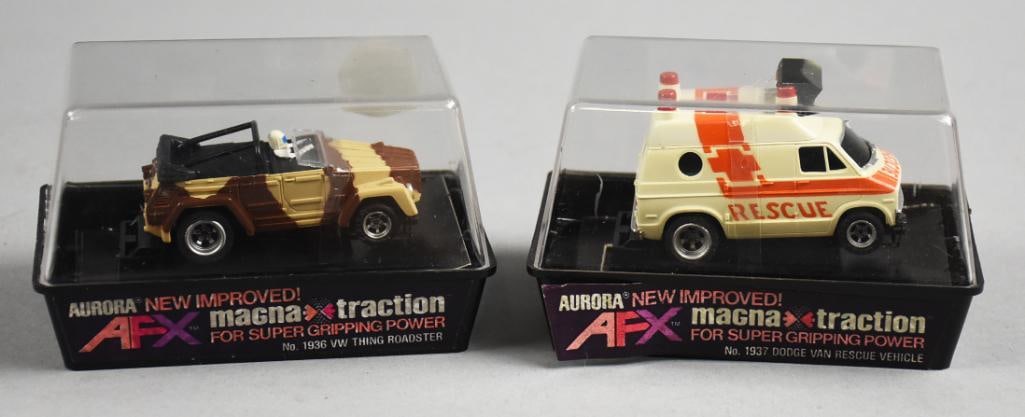 1976 Aurora Slot Car AFX Magna Traction VW Thing/Dodge Van-MIB-NOS: Lot is two 1976 Slot Cars Aurora AFX Magna Traction VW Thing Roadster/Dodge Van Rescue Vehicle-MIB-NOS. Single owner collection from the largest toy collector on the West Coast.