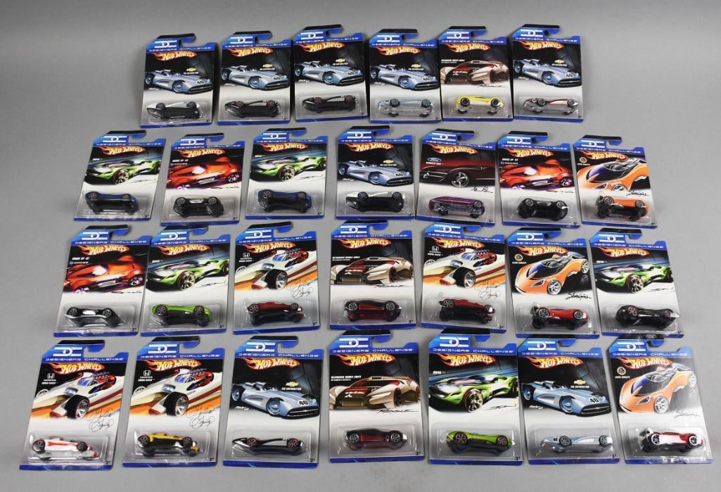 (27) 2007 Mattel Hot Wheels Designer Challenge-MOC-NOS: Lot is 27 2007 Mattel Hot Wheels Designer Challenge 2007 Hot Wheels Designer's Challenge - Chevroletor Designed by GM. A sleek, futuristic roadster in silver with aggressive front grille and side pipe