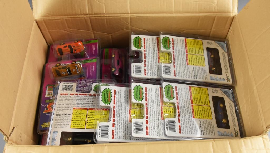 (49) 1990s Playing Mantis Sizzlers Rechargeable-MOC-NOS: Lot is 49 1990s Playing Mantis Sizzlers Rechargeable-MOC-NOS. NOTE! WILL COME IN THIS JOHNNY LIGHTNING CASE, BUT IS NOT ORIGINAL! Single owner collection from the largest toy collector on the West Coa