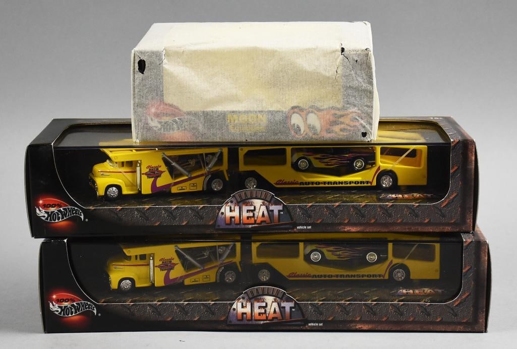 2000-01 Mattel Hot Wheels Moon Equipped/Haulin' Heat-MIB-NOS: Lot is three 2000-01 Mattel Hot Wheels Moon Equipped and two Haulin' Heat-MIB-NOS. Single owner collection from the largest toy collector on the West Coast.