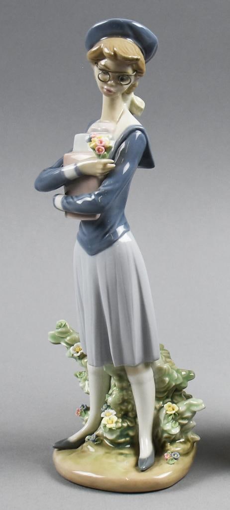 1990-93 Lladro My First Class 5708, Original Box: Darling vintage porcelain Lladro, introduced in 1990, retired in 1993. She is called My First Class, number 5708. She stands approx. 10" tall and comes in her original box.