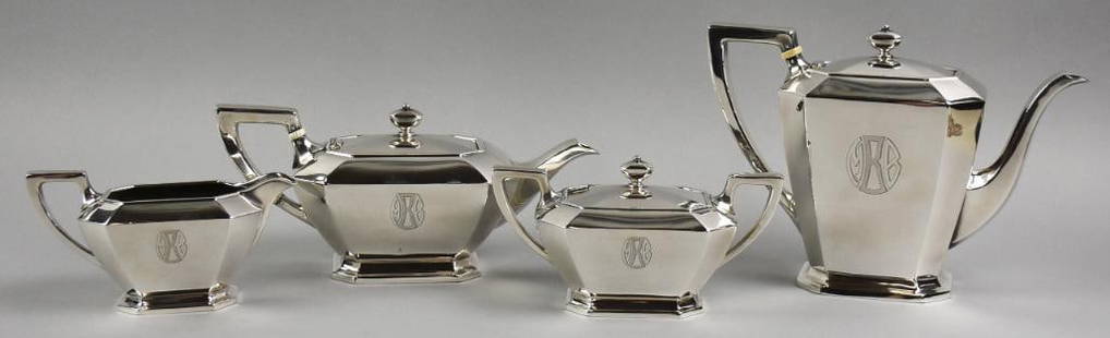 1928-29 Gorham Sterling Fairfax Four Piece Tea Set: Great Art Deco sterling tea set from Gorham in the pattern Fairfax. Each in a great Art Deco style with clean lines and include a coffee pot, tea pot, lidded sugar bowl and cream pitcher. They have tw