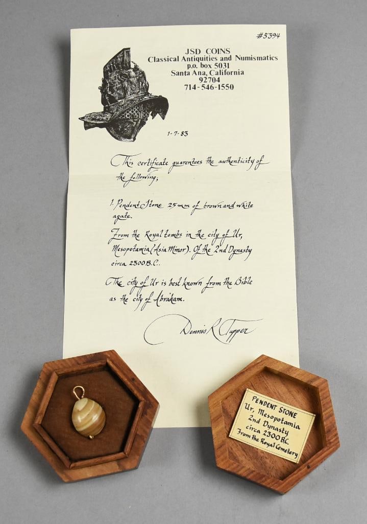 c2300 BC Han Dynasty Ur, Mesopotamia 25mm Agate Pendant-LOA: Very cool piece of history! It is a pendant from the Royal Cemetery in Ur, Mesopotamia, Han Dynasty. Ur is the birthplace of Abraham as noted in the Bible.?This awesome pendant is 25 mm tan agate in g