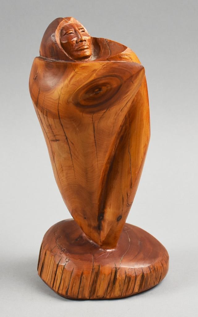 1993 Troy Williams The Noble One-Carved Juniper: Beautiful carving from American sculptor artist Troy Williams. This piece is called The Noble One and is carved from juniper. Figure is a Native American with blanket draped around him. It is signed a