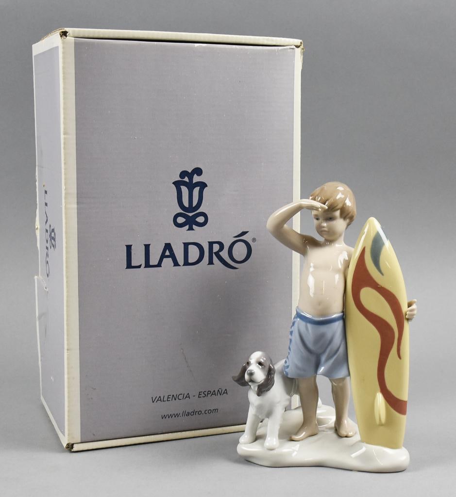 2005 Lladro Surf's Up No. 8110 Orig Box: Adorable porcelain Lladro from 2005. He is called Surf's Up No. 8110. He stands approx. 8.5" tall.