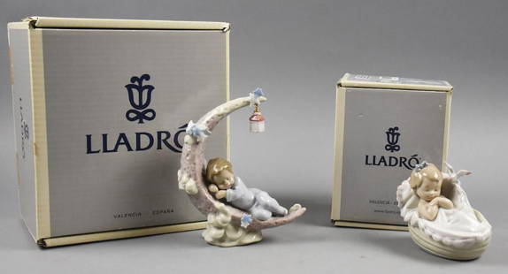 Lladro Comforting Dreams & Heavenly Slumber-W/Boxes: Darling pair of porcelain Lladro figurines in their original boxes. Comforting Dreams 6710 released in 2000 and Heavenly Slumber 6479 released in 1997. Measure approx. 4" and 7.5" tall.