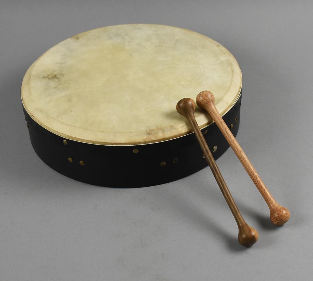 Irish Bodhran Single Head Drum w/ Double Ended Sticks: Great Irish single head drum known as a Bodhran. These style drums have an open back that are held by cross bar and struck with a double ended stick known as a tipper or bone. No visible marks, drum m