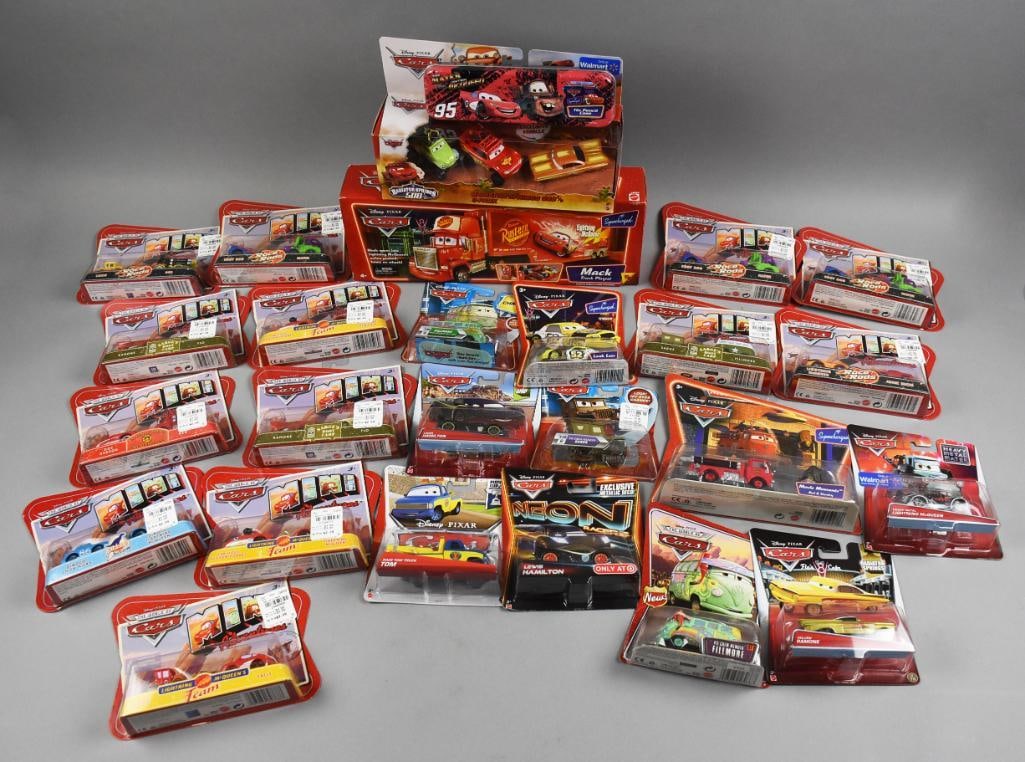 (26) 2000s Mattel Disney Pixar Cars Die-Cast-MIP-NOS: 26 die-cast cars produced by Mattel, inspired by Disney Pixar's Cars franchise. Includes various vehicles, Mini, playsets, and exclusives, sealed in original retail packaging, with some featuring stor