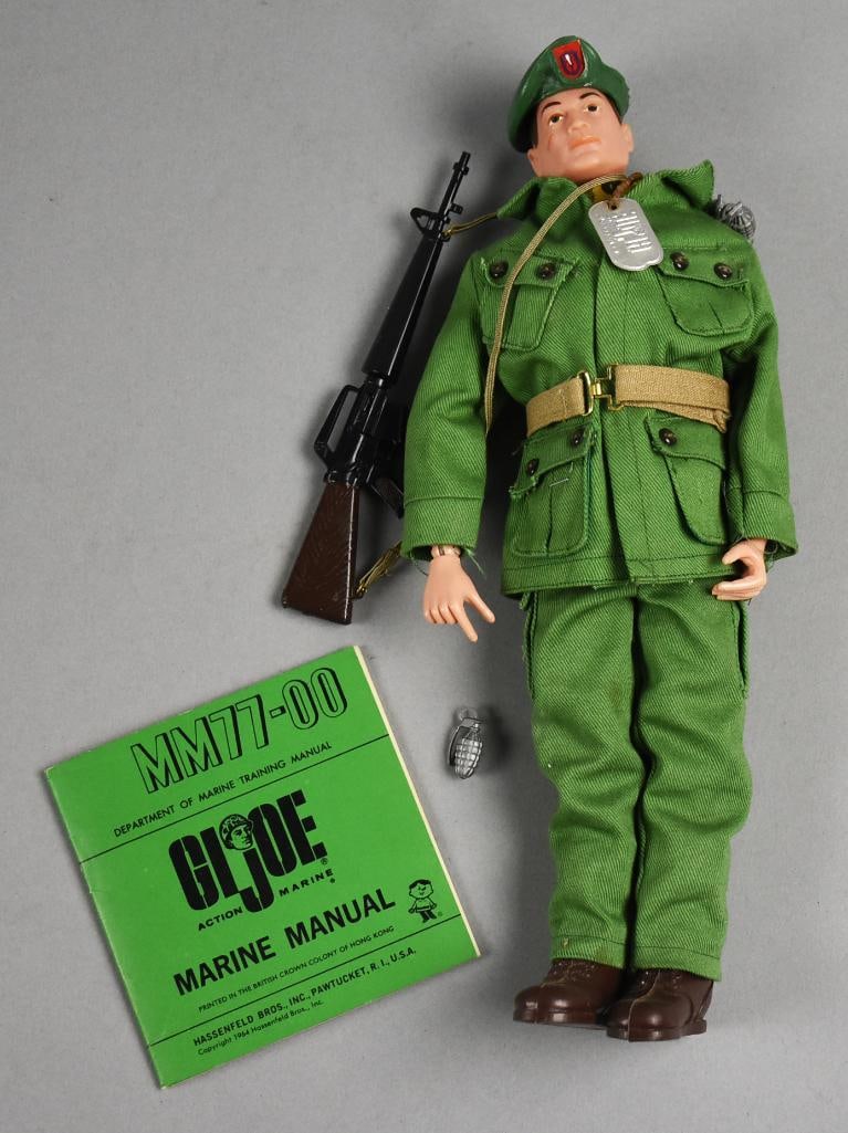 1966 Hasbro GI Joe Green Beret In Uniform: Fantastic Hasbro GI Joe Green Beret action figure. He wears a full uniform with beret, shot gun and grenade. Includes a Marine Training Manual. Mark on buttocks was used in 1966. Single owner collecti