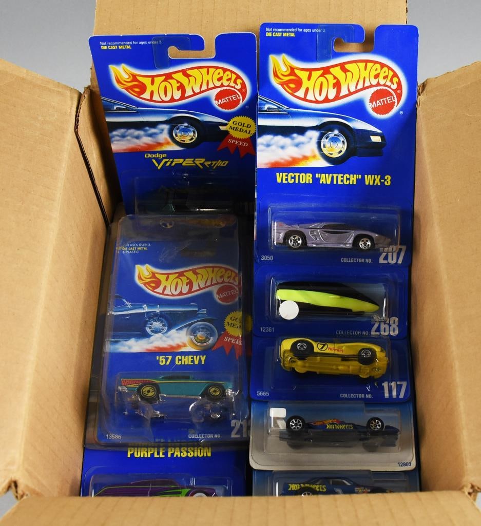 (55) 1990s Mattel Hot Wheels Blue Card Assortment-MOC-NOS: Lot of 55 Mattel Hot Wheels die-cast cars from the 1990s Blue Card series, all mint on card and new old stock. This assortment showcases a wide range of popular castings from the era, featuring vibran