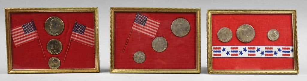 1776-1976 Bi-Centennial Coin Displays Dollar Half & Quarter: Three framed displays featuring US coins arranged alongside miniature American flags and patriotic motifs. Each frame contains a selection of coins, including bicentennial designs with icons like the 