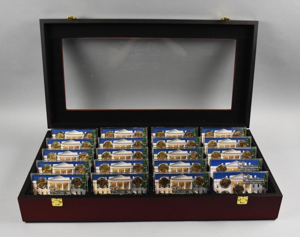Presidential Dollar Series Coin Sets with Display Case: A complete Presidential Dollar Series 20 pc. set housed in a wooden display case with a glass window. The set includes coins from both the Denver and Philadelphia Mints, with each coin encased in prot