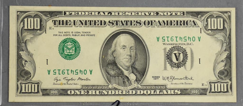 1977 $100 One Hundred Dollar Bill Inverted Serial Error: Lot is a 1977 $100 One Hundred Dollar, Inverted Serial-Uncirculated. Serial number A 04541915 A which is inverted. Federal Reserve Note featuring an inverted serial number error. Denomination of $100