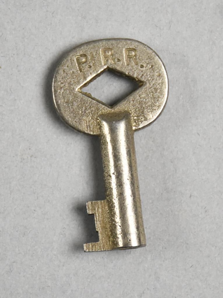 Antique Pennsylvania Railroad Co Cast Steel Key: Awesome antique key for the Pennsylvania Railroad Co. Appears to be cast steel with impressed PRR on one side and Y3814 impressed on back. Measures approx. 1" x 2".