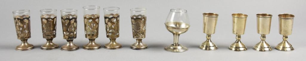 Vintage Mexican Tane & More Mexican Sterling Drink Ware: This is a great selection of sterling drink ware. First piece is a snifter with glass liner, appears to be from Tane, marked inside base. Next are four cordials, marked what appears to be ARC attribut
