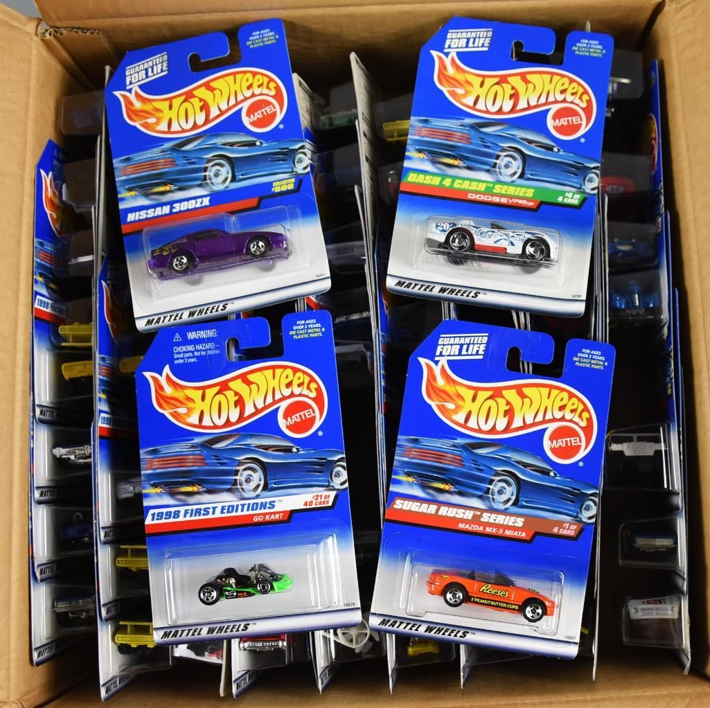 (72) 1990s Mattel Hot Wheels Asst. Factory Case MOC-NOS: Lot is a 1990s Mattel Hot Wheels Asst. Factory Case - MOC-NOS. Case may be original with all 72 cars included. Single owner collection from the largest toy collector on the West Coast.