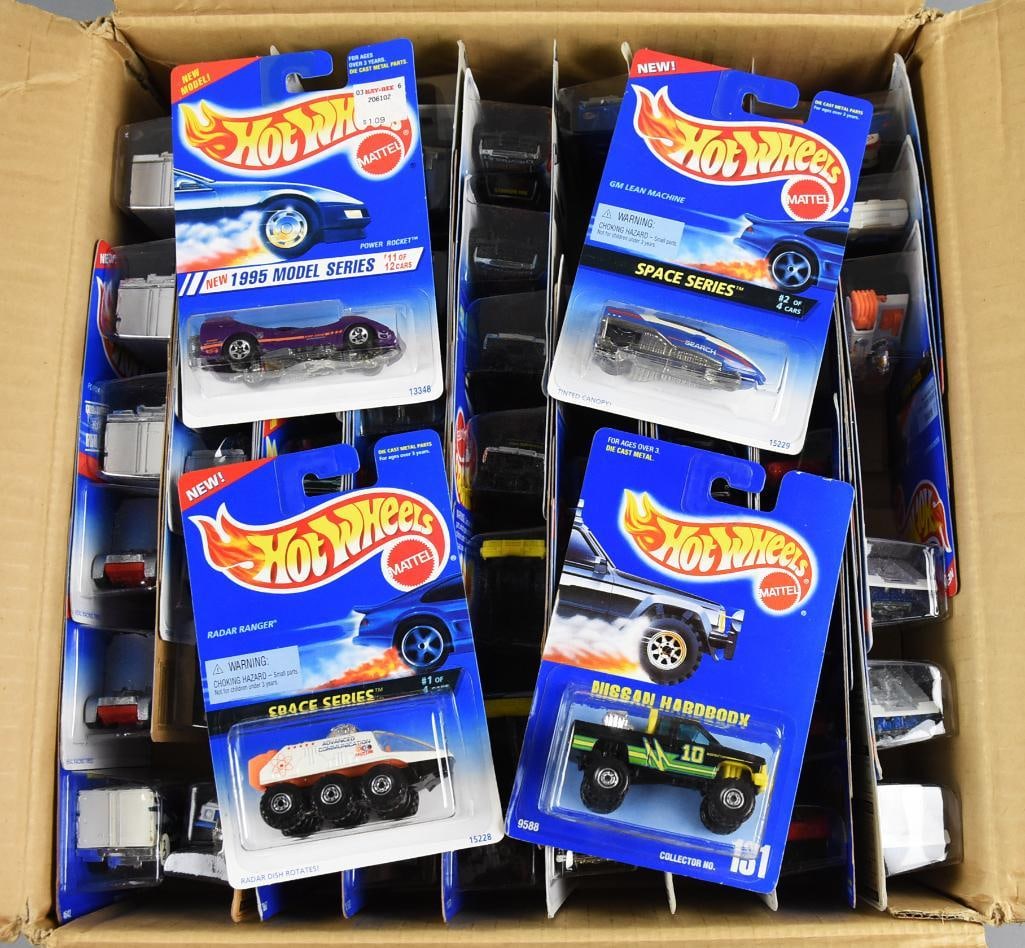 (70) 1990s Mattel Hot Wheels Die-Cast-Target Hot Wheels Case: Lot is 70 1990s Mattel Hot Wheels Die-Cast-Target Hot Wheels Case. Includes Kenworth, Cobra, Nissan and more. Virtually unsorted. Case appears to be original sent to Target. Single owner collection fr