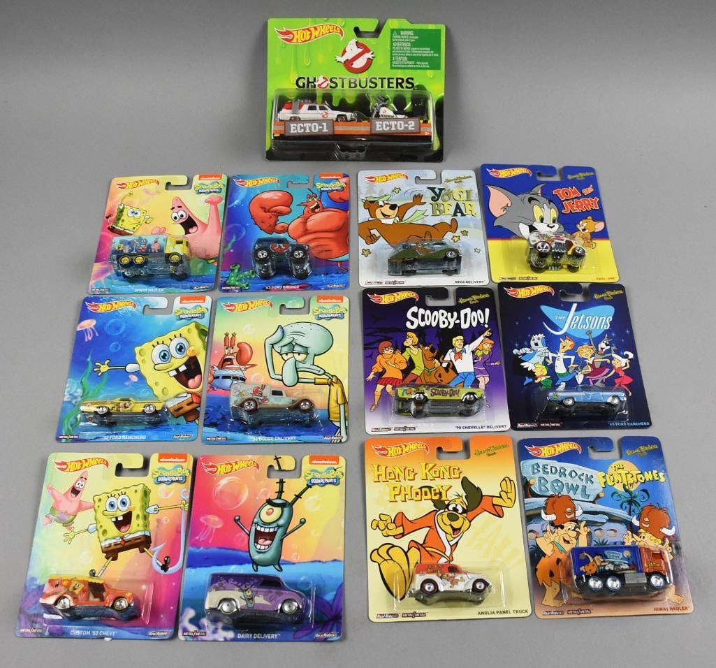 (13) 2000s Mattel Hot Wheels Cartoon Die-Cast MOC-NOS: Lot is 13 2000s Mattel Hot Wheels Cartoon Die-Cast - MOC-NOS. Includes Sponge Bob, Ghost Busters, Scooby Doo, Tom & Jerry, Jetsons, Hong Kong Phooey, Yogi Bear and Flintstones. Single owner collection