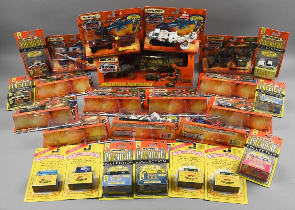 (25) 1990s Matchbox Assortment, Mission Bravo & More-MIP-NOS: Lot is 25 1990s Matchbox Assortment, Mission Bravo & More MIP-NOS. Also includes Authentic Recreations of Matchbox Early Vehicles, Premier Collection and a Mission Bravo Phantom Fortress.? Single owne