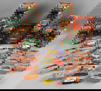 1990s Mattel Matchbox & More Die-Cast Assortment-MIP-NOS: Lot is 30 1990s Mattel Matchbox &amp; More Die-Cast Assortment-MIP-NOS. Includes Premier First Editions with duplicates, Krispy Kreme?1938 Delivery Trucks, Moko Lesney No. 1, Screamin' Stocks. Maisto?