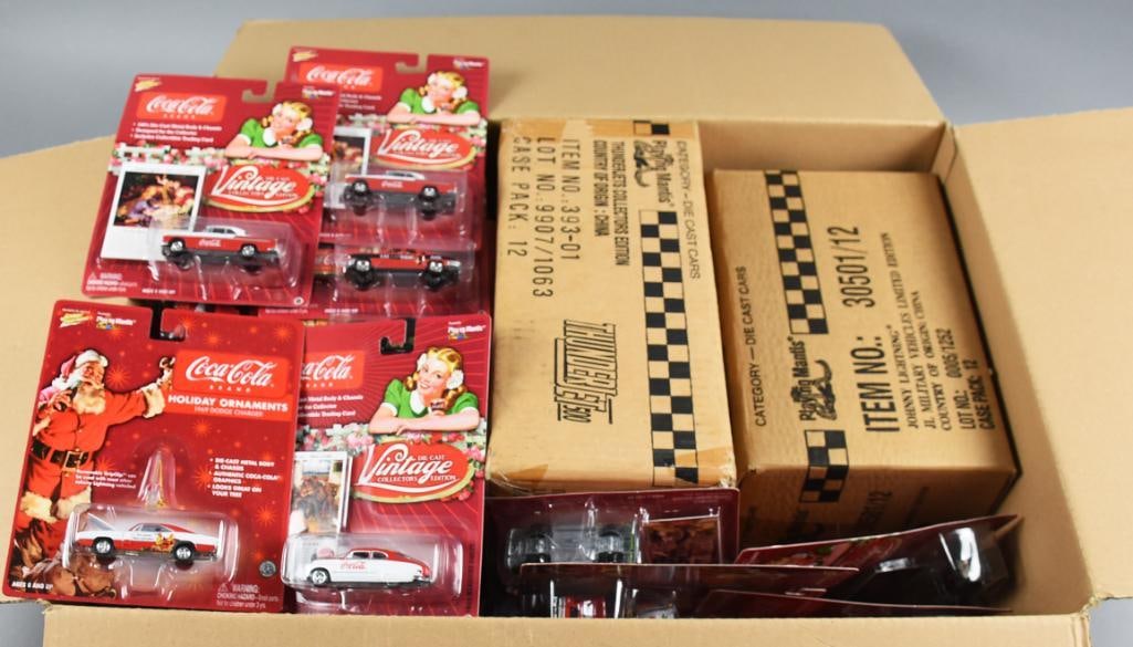 (2) 1990s-00s Johnny Lightning Factory Cases, PLUS MOC NOS: Lot is two 1990s-00s Johnny Lightning Factory Cases, PLUS-MOC-NOS. Cases includes Military Vehicles, Lightning Brigade, ThunderJets in factory cases and Coca Cola, no factory case. Single owner collec