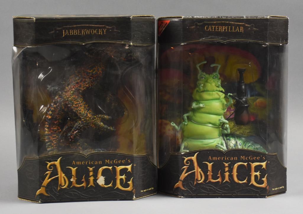 (2) 2000 American McGee Alice in Wonderland Figures-MIB-NOS: Lot is two 2000 Milo's Workshop American McGee Alice in Wonderland Figures-MIB-NOS. Includes Jabberwocky and Caterpillar.