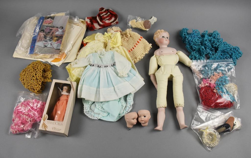 Vintage Bisque Head Doll Assortment w/ Clothing: Darling little dolls are vintage and include dresses and other accessories. One doll is in her original box and is Gift World of Gorham. Another doll was created by Addiebelle Hunt in 1982 with her na