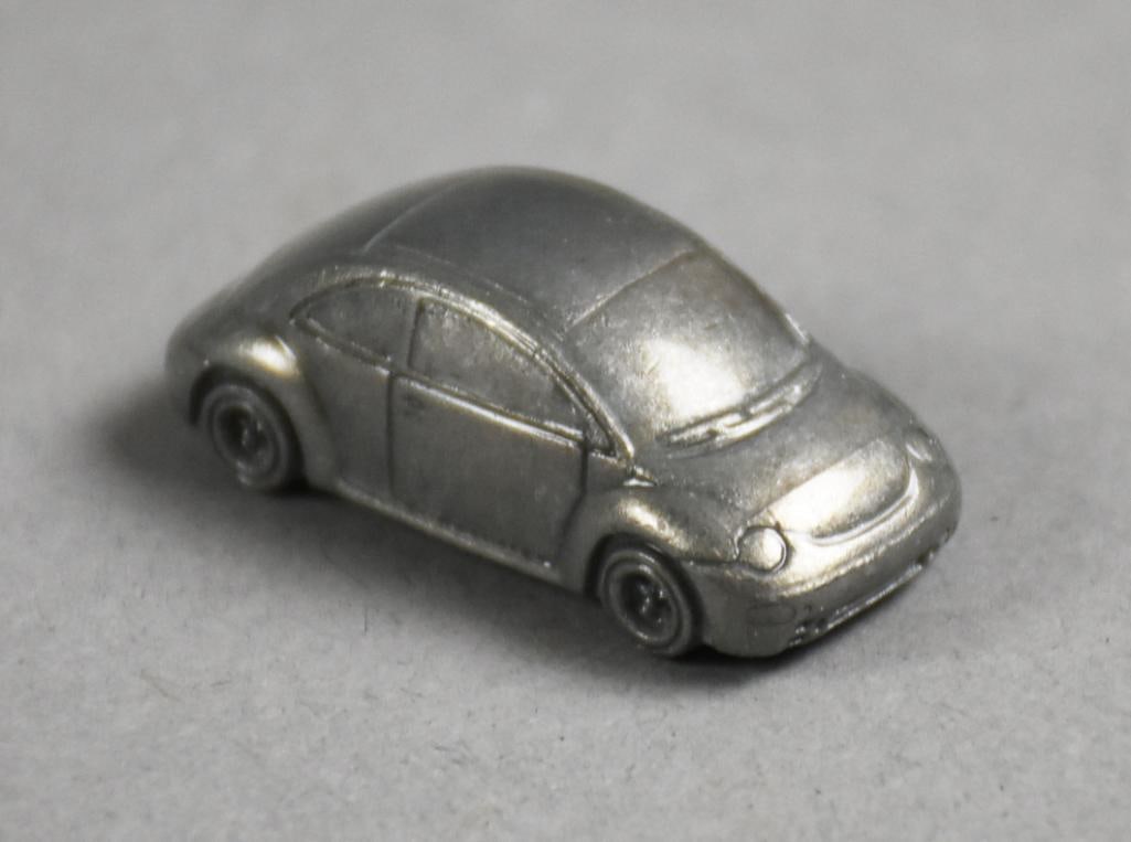 Prototype Monopoly Game Tokens Volkswagen Beetle: Lot is a Prototype Monopoly Game Tokens Volkswagen Beetle. Single owner collection from the largest toy collector on the West Coast.