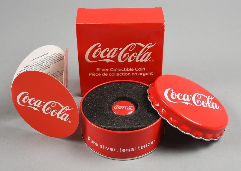 Coca Cola Pure Silver Collectible Coin Legal Tender 6 Grams: Lot is an advertising for Coca Cola. Pure silver legal tender coin. Comes in original packaging as shown.