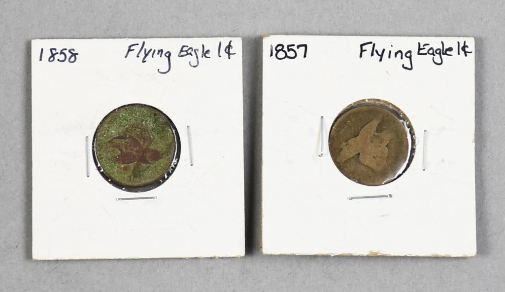 1857 & 1858 United States Flying Eagle Pennies: Lot is a 1857 and an 1857 United States flying eagle penny in sleeves.
