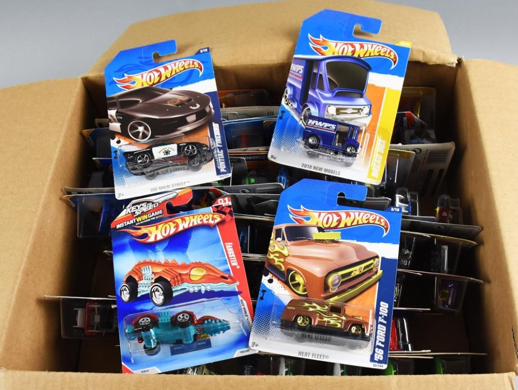 (114) 2000s Mattel Hot Wheels Various Assorted Die-Cast-NOS: Mattel Hot Wheels 2000's random assortment. This lot includes (114) 2000's Hot Wheels cars (basic blue card assortment). This lot may include duplicates. Each card back is brand new and has never been