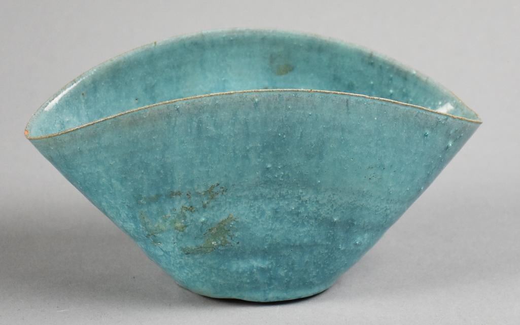 Beatrice Wood (1893-1998) Thrown & Folded Blue Bowl: This fantastic bowl is from Mama of Dada Beatrice Wood. Red clay vase, thrown and pressed in the center giving an oval look with a? light blue glaze Indented thumprints on the side of the bowl. . Hand