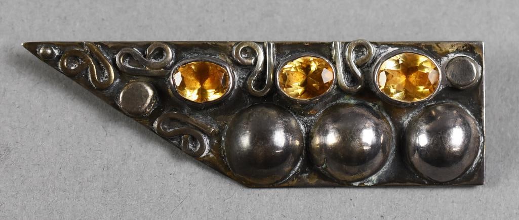 Consuelo Campos Mexican Sterling Citrine Modernist Brooch: Terrific vintage brooch believed to be Consuelo Campos. Solid sterling modernist style with citrine, silver cabochon and abstract scrolls. Hand etched signature on back, 925 and 89.?From the home of a
