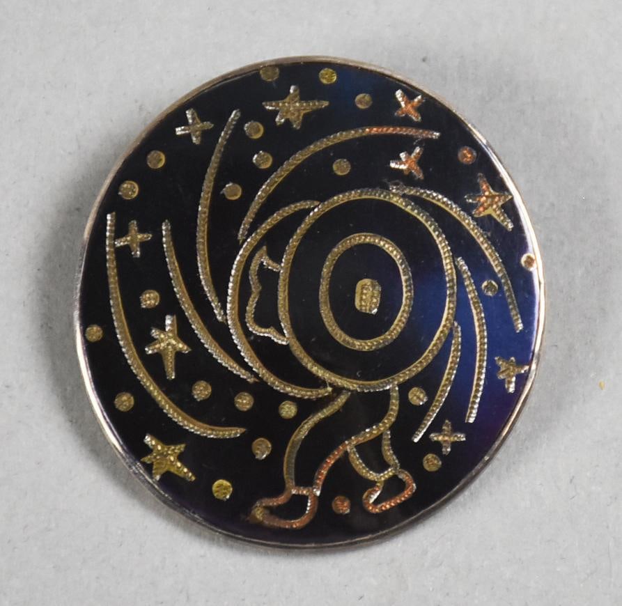 Los Castillo Silver Artist Constellation: An enamel and silver Los Castillo Mexican silver artist brooch. With a stylized man with stars in enamel and silver. Marked, "Los Castillo, Made in Mexico, 100". Approx. 1.5" in dia.?From the home of