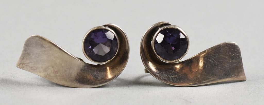 Miguel Melendez Taxco Sterling Amethyst Earrings: Wonderful pair of sterling earrings from Taxco Mexico jewelry artist Miguel Melendez. Sterling earrings with amethyst in what appears to be a stylized apostrophe. Well marked on back, screw back earri