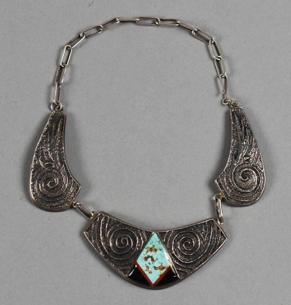 Preston Monongye Hopi Sterling Turquoise Tufa Cast Necklace: This gorgeous necklace is from Hopi sterling jewelry artist Preston Monongye (1927-1991). Each piece is cast in tufa stone with symbolic swirls, symbols of eternity, universe, evolution, growth and li