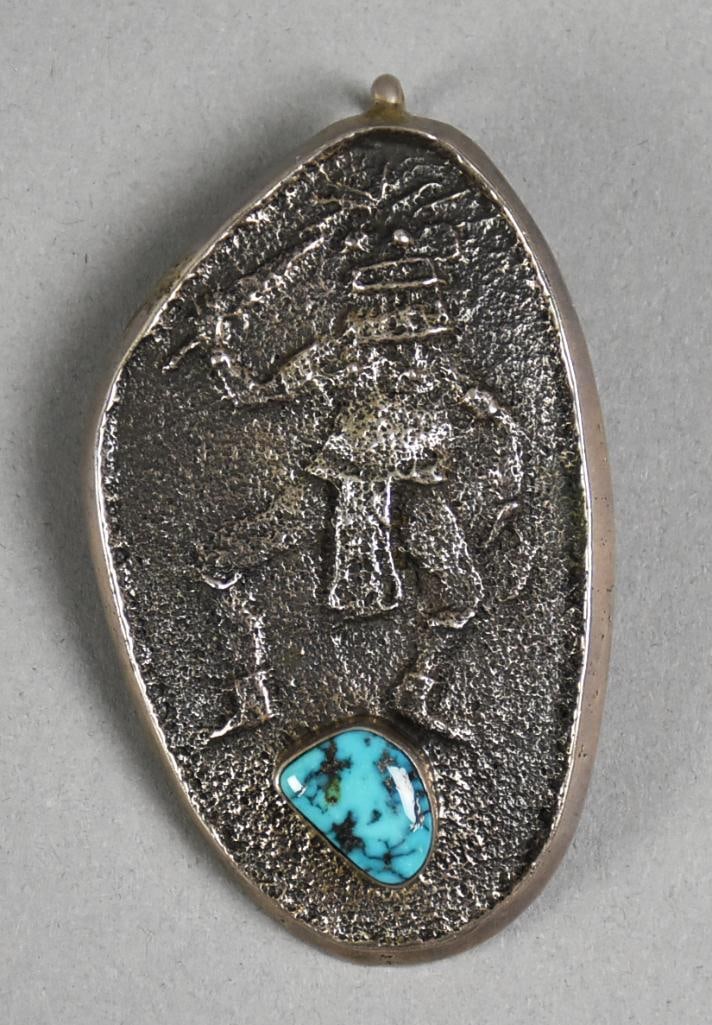 Preston Monongye Hopi Sterling Turquoise Tufa Cast Pendant: Amazing sterling pendant from Hopi sterling jewelry artist Preston Monongye (1927-1991). This tufa cast pendant with what appears to be a Mudhead Kachina?and single polished turquoise stone. Applied c