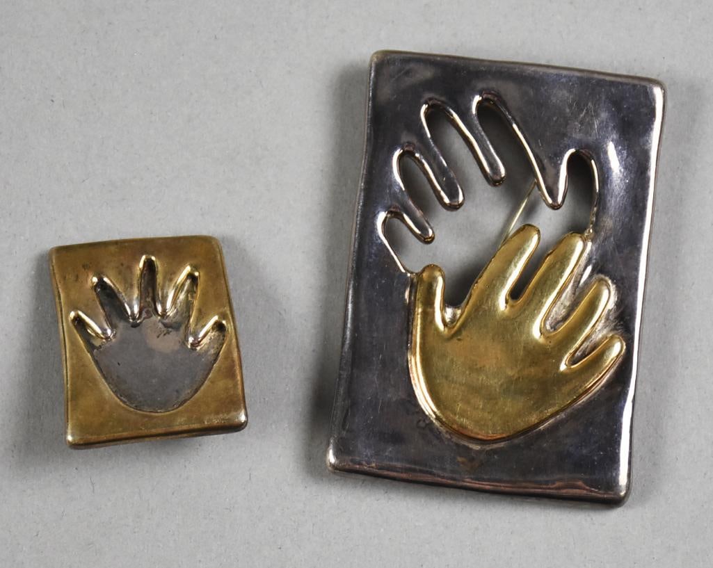 Sterling & Vermeil Hand Brooch and Earring, Signed: These are cool pieces of sterling jewelry. One is a double hand, one cut away and one vermeil, the other piece is a single earring, with hand impression, vermeil on edges. Measure 2" x 3" and 1.25" x 