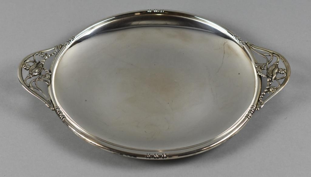 Michael C. Fina Geo. Jensen Styler Sterling Blossom Tray: This fabulous sterling silver tray is from Michael C. Fina Co. Inc. It is in the popular George Jensen style with open work handles with flower blossoms and measures approx. 11" wide. Well marked on b