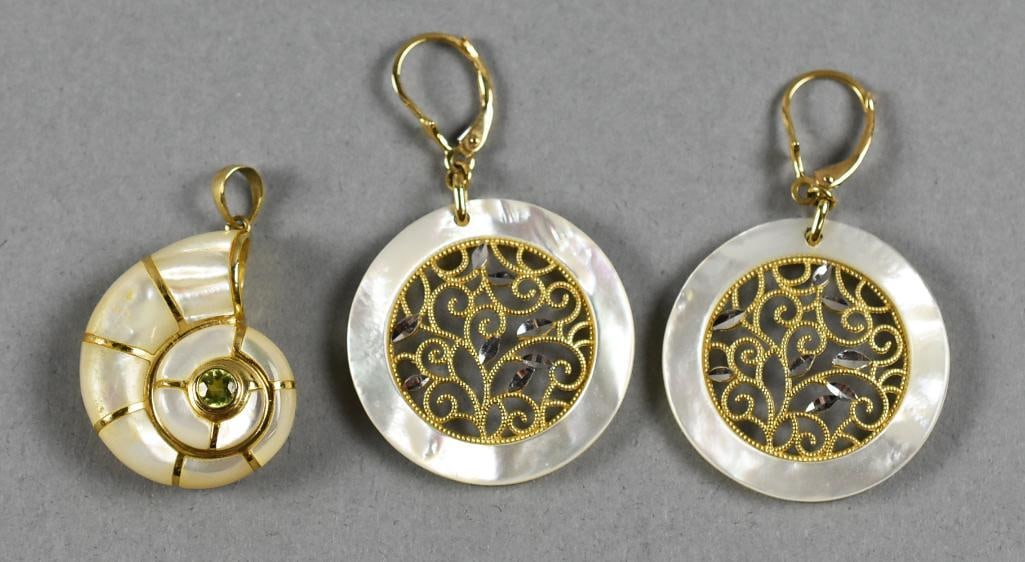 14k Gold Mother of Pearl Set: Here is a unique and beautiful set! The pendant is an ammonite style shaped Mother of Pearl with 14k gold wiring around the edges and bail and is set with a small green quartz stone. The earrings are
